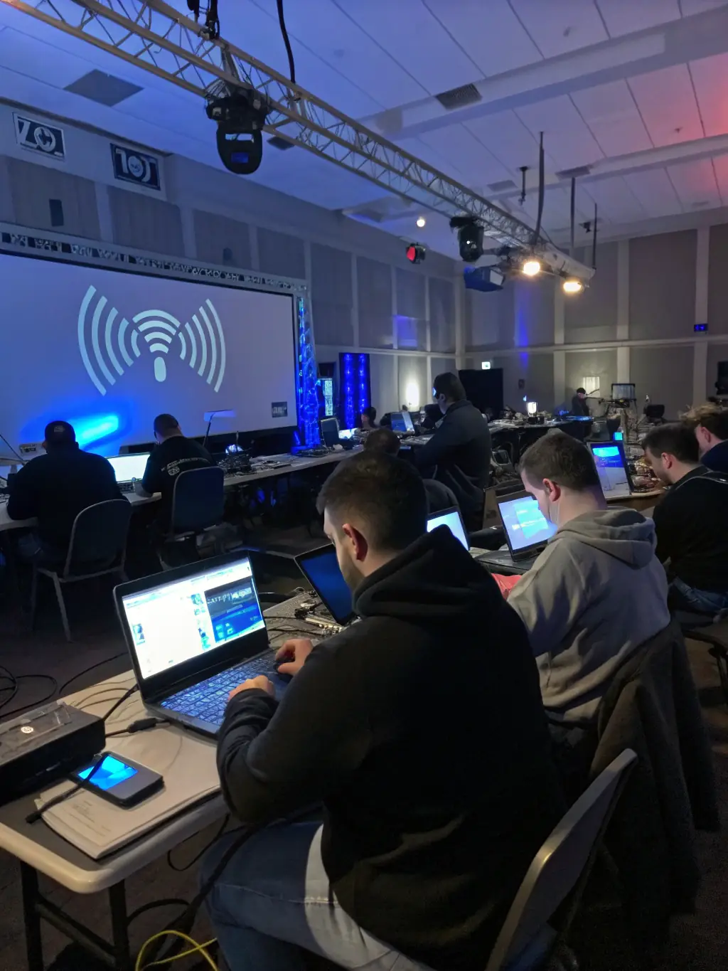 A photo of a workshop in progress, where participants are learning about digital music production techniques, highlighting MANB's commitment to education and community engagement.